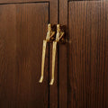 HUMANA sculptural brass human figure cabinet handle — 147mm polished gold artistic drawer pull