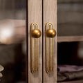 NORDICLUX art deco ball knob cabinet handle and drawer pull in antique bronze — vintage Nordic style hardware