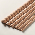 Unpainted carved wood onlay trim with decorative line pattern for mirrors and furniture
