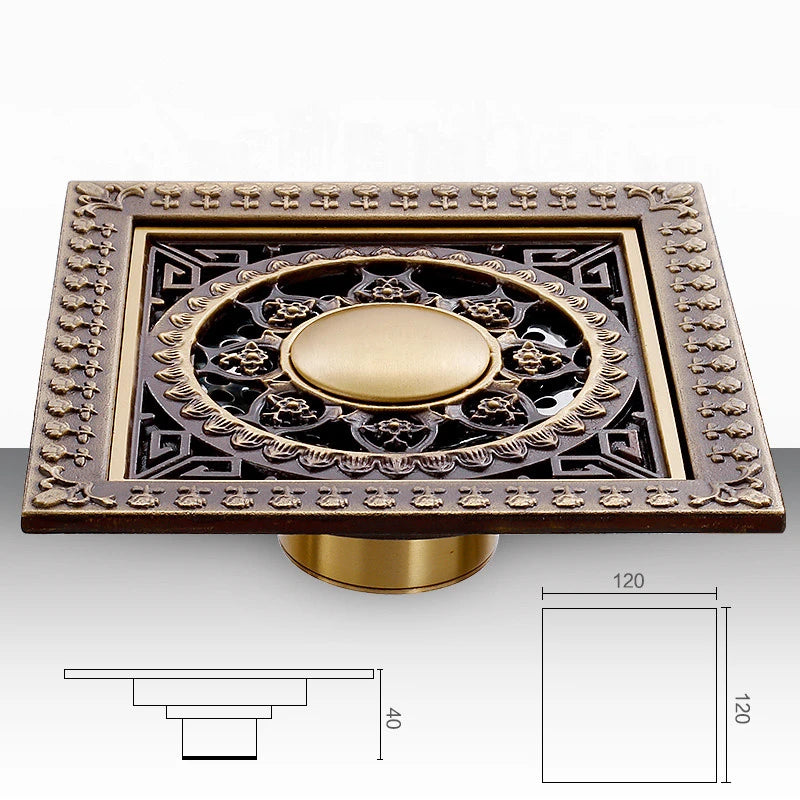 Collection of 12 antique brass carved square shower drains with ornate designs including floral medallion, geometric mandala, sailing boat, and nature motifs