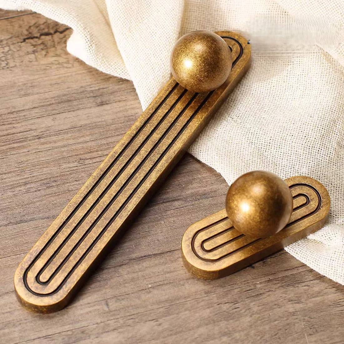 NORDICLUX art deco ball knob cabinet handle and drawer pull in antique bronze — vintage Nordic style hardware