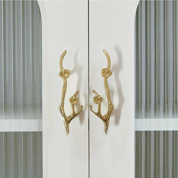 BLOSSOM solid brass flower branch cabinet pull handles in polished gold — sculptural botanical drawer hardware