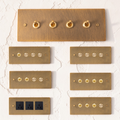 Retro aged brass toggle and dimmer switch panel in 1–4 gang options made from solid brass.