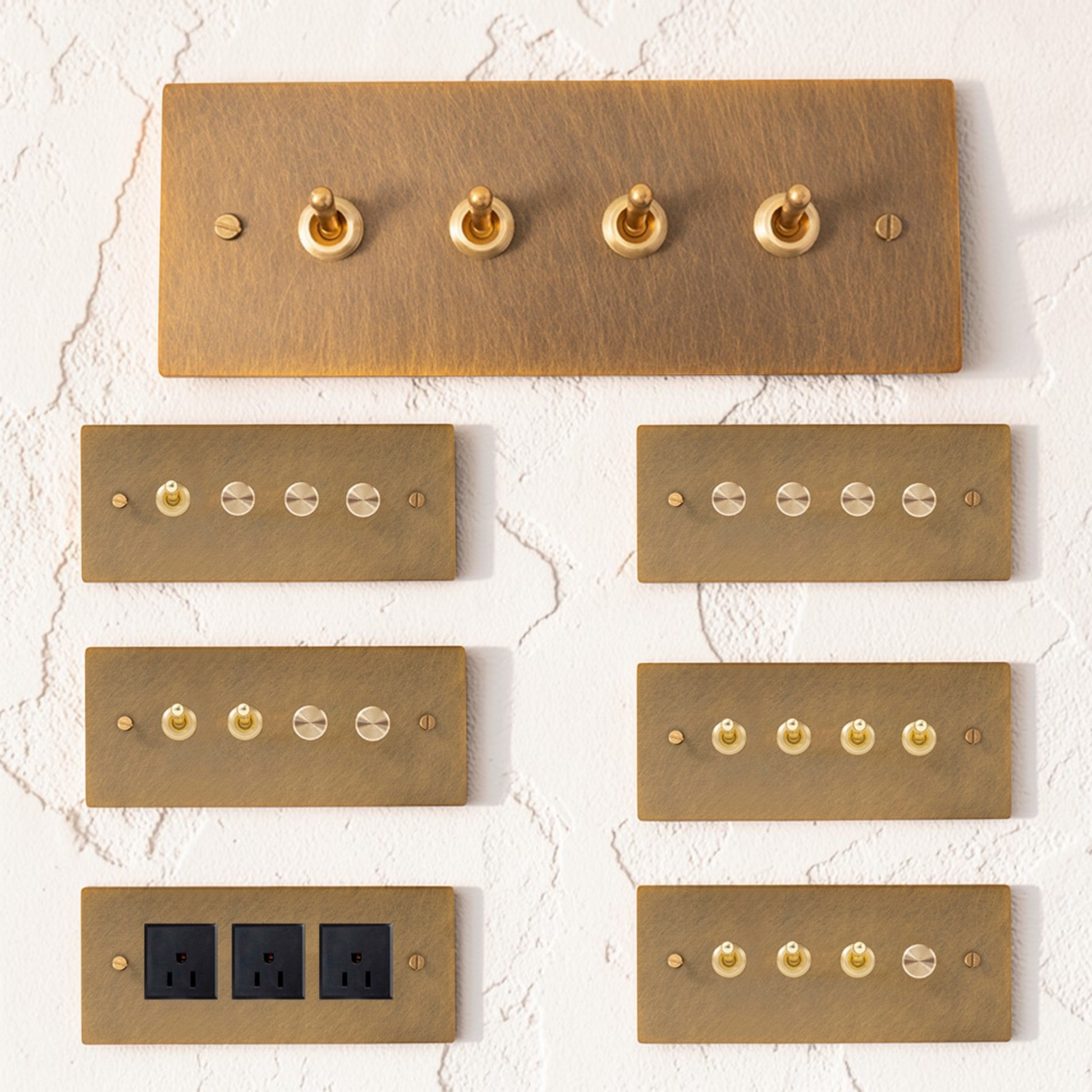 Retro aged brass toggle and dimmer switch panel in 1–4 gang options made from solid brass.