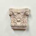 Decorative wooden corbel with intricate carvings on a light gray background