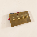 Custom labeled retro brass toggle switch plate

Aged brass dimmer switch with engraved labels

Vintage brass wall switch plate for kitchen and hallway

Solid brass labeled switch cover for luxury interiors