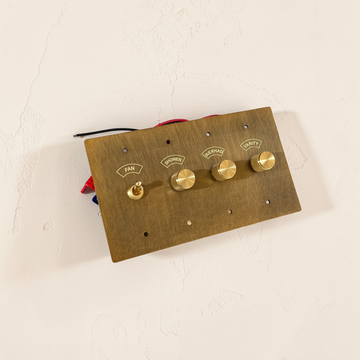 Custom labeled retro brass toggle switch plate

Aged brass dimmer switch with engraved labels

Vintage brass wall switch plate for kitchen and hallway

Solid brass labeled switch cover for luxury interiors