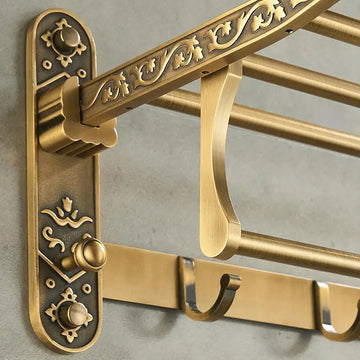 The Capri Antique Brass Wall-Mounted Foldable Towel Rack