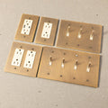 Aged brass retro toggle, dimmer, and outlet switch panel – solid brass wall plate