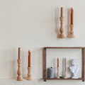 Solid maple candlestick holders on a farmhouse dining table