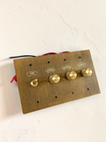Custom labeled retro brass toggle switch plate

Aged brass dimmer switch with engraved labels

Vintage brass wall switch plate for kitchen and hallway

Solid brass labeled switch cover for luxury interiors