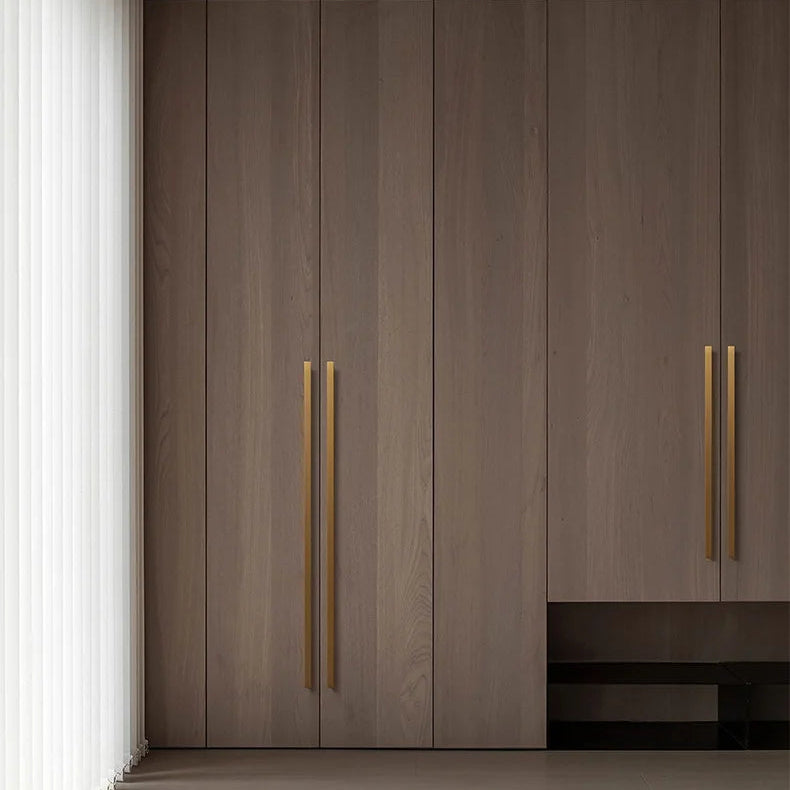 FORMA Figure-7 cabinet handles in matte black, space grey and brushed gold — modern L-shape kitchen and wardrobe pulls