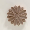 Round vintage floral wood carving rosette on a white background - Unpainted natural wood.