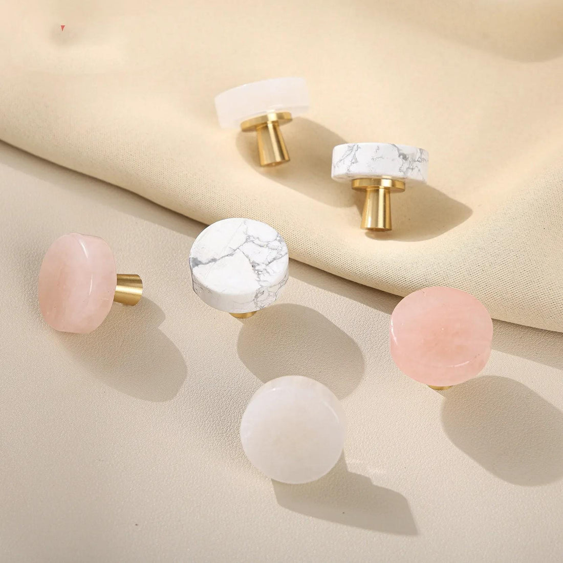The Nordic Orbit circular grey drawer knobs for minimalist furniture and kitchen cabinets.