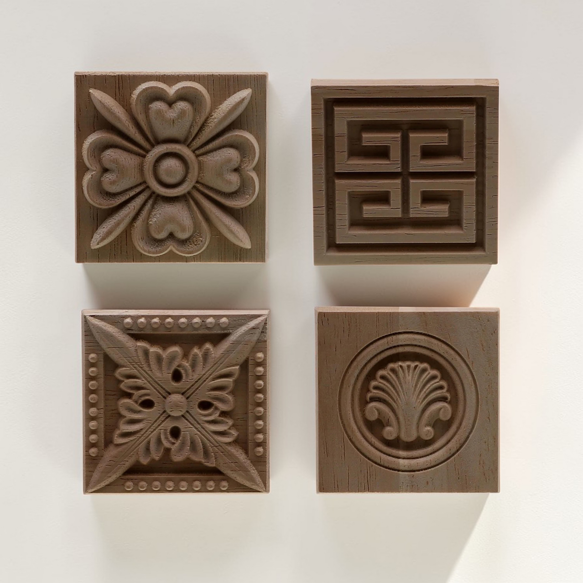 Square floral wood carving applique for furniture and wall decoration.