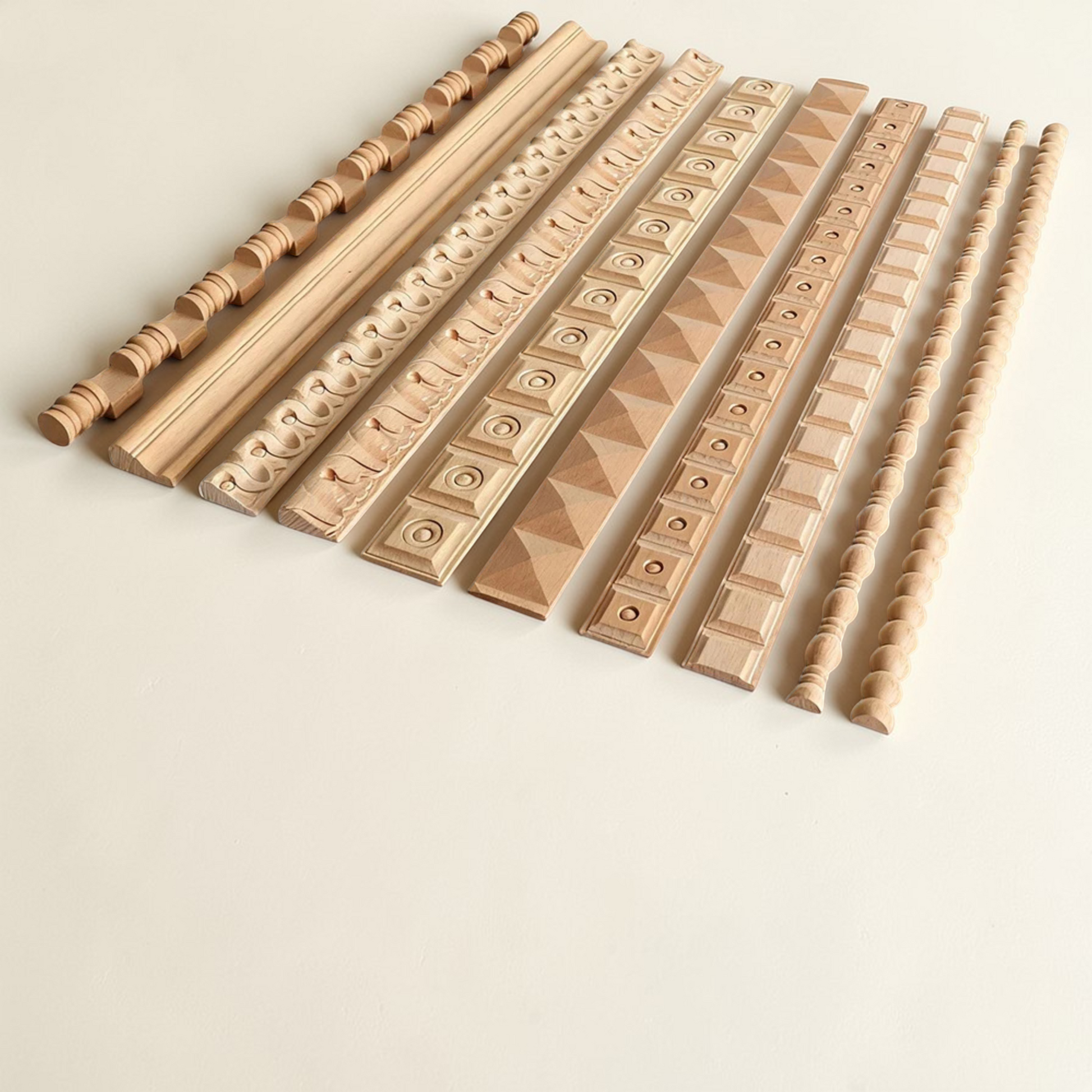 Decorative wood carved line bars for mirror frames and corner cabinet edge trim.