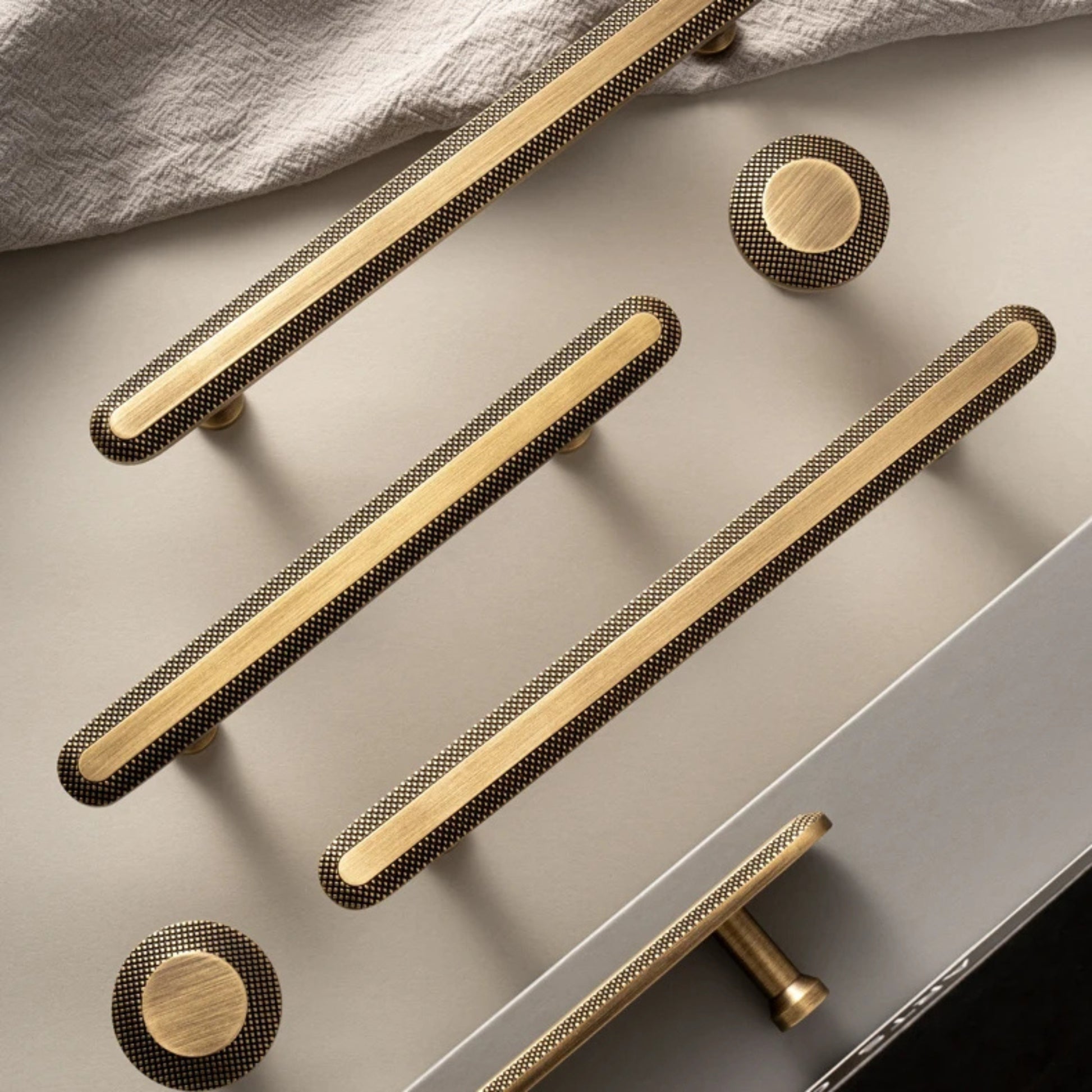 Knurled antique brass kitchen cabinet handle with grid texture