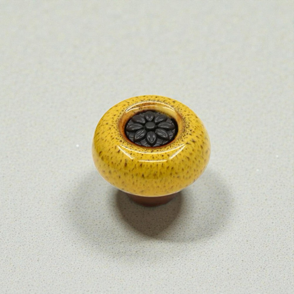 Installation of retro flower ceramic knob on cabinet door
