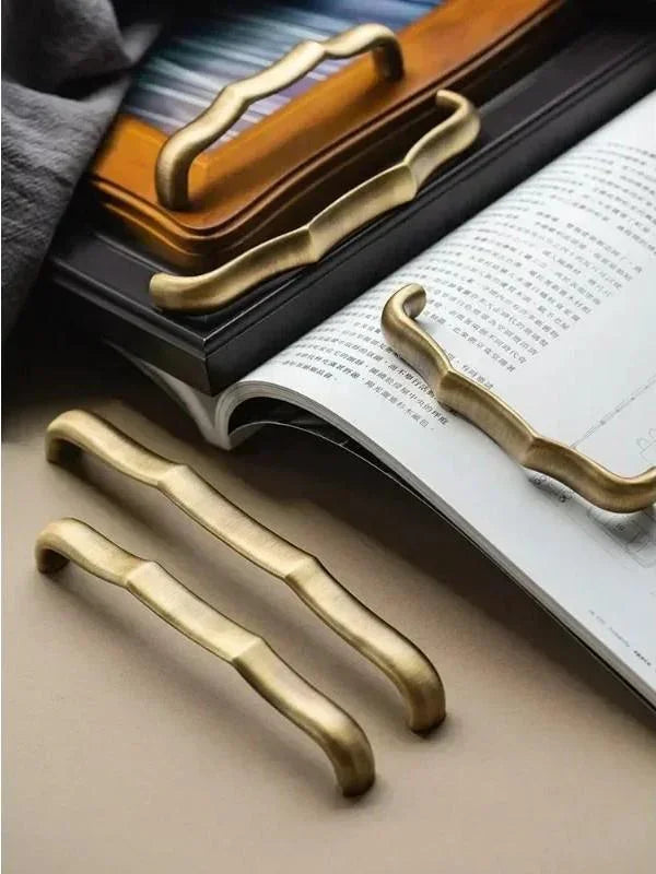 Antique brass cabinet handle shown in 96mm, 128mm, and 160mm sizes